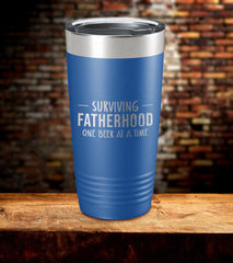 Surviving Fatherhood One Beer at a Time Laser Engraved Tumbler (O)
